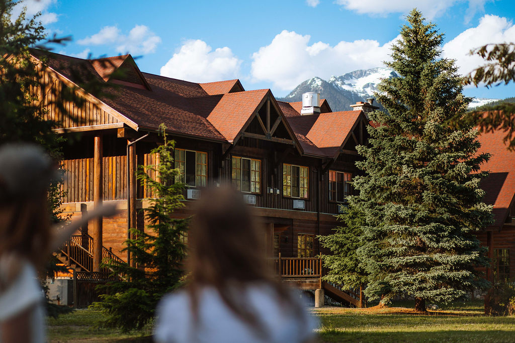 Glacier House Lodge in the summer against the mountains